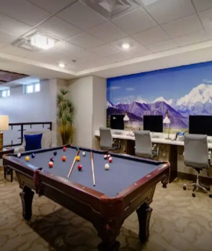 Pool Table activity room with pool table and computers | Aspen Creek Senior Living